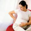 Боли в пояснице при беременности: причины и способы устранения дискомфорта